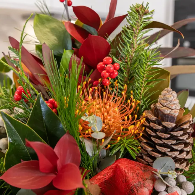 Comprar Centro navideño esencia invernal en Barcelona | Ramos y centros de flores de Navidad