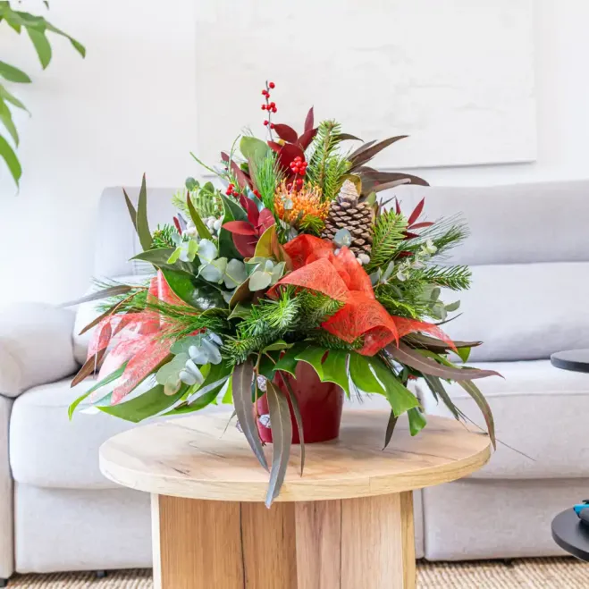 Comprar Centro navideño esencia invernal en Barcelona | Ramos y centros de flores de Navidad